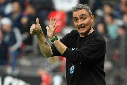 Nov 5, 2023; Vancouver, British Columbia, CAN; Vancouver Whitecaps FC head coach Vanni Sartini reacts to a play against Los Angeles FC during the second half of game two in a round one match of the 2023 MLS Cup Playoffs at BC Place. Mandatory Credit: Anne-Marie Sorvin-USA TODAY Sports