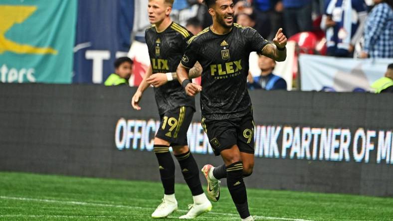 Nov 5, 2023; Vancouver, British Columbia, CAN;Los Angeles FC forward Denis Bouanga (99) celebrates after beating the Vancouver Whitecaps in game two in a round one match of the 2023 MLS Cup Playoffs at BC Place. Mandatory Credit: Simon Fearn-USA TODAY Sports