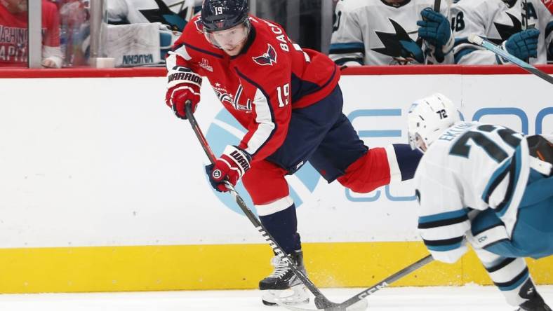 Oct 29, 2023; Washington, District of Columbia, USA; Washington Capitals center Nicklas Backstrom (19) controls the puck during the first period against the San Jose Sharks at Capital One Arena. Mandatory Credit: Amber Searls-USA TODAY Sports