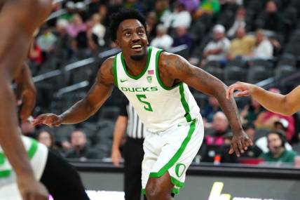 Nov 6, 2023; Las Vegas, Nevada, USA; Oregon Ducks guard Jermaine Couisnard (5) plays against the Georgia Bulldogs during the second half at T-Mobile Arena. Mandatory Credit: Stephen R. Sylvanie-USA TODAY Sports