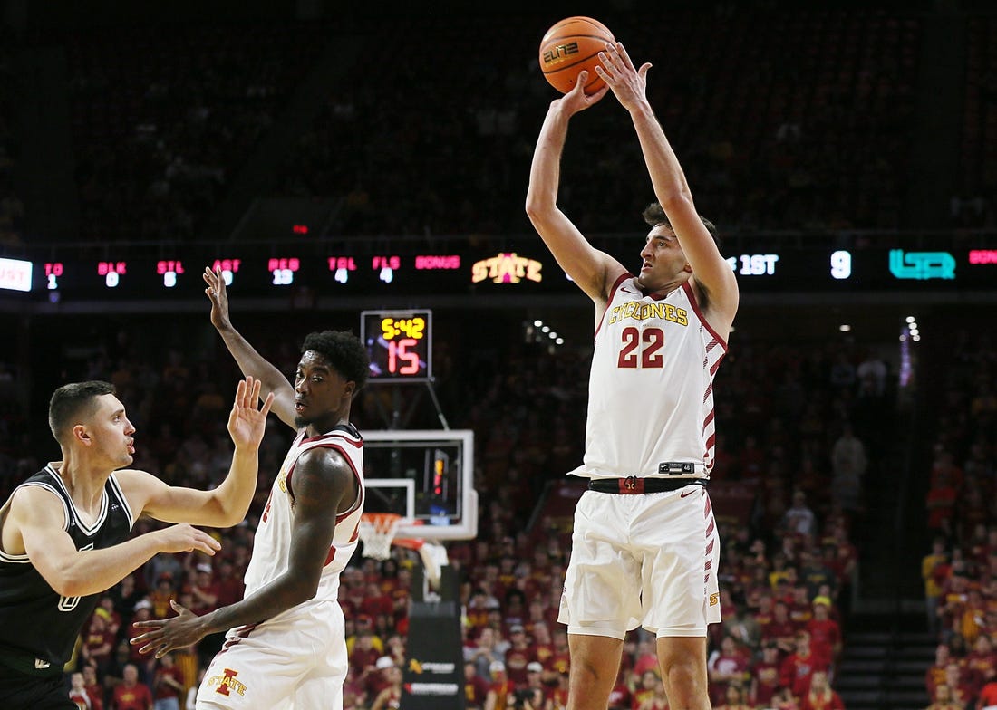 Iowa State Cyclones forward Milan Momcilovic (22) takes a three-point shot against Green Bay during the first half at Hilton Coliseum on Monday, Nov. 6, 2023, in Ames, Iowa.