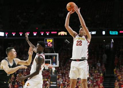 Iowa State Cyclones forward Milan Momcilovic (22) takes a three-point shot against Green Bay during the first half at Hilton Coliseum on Monday, Nov. 6, 2023, in Ames, Iowa.