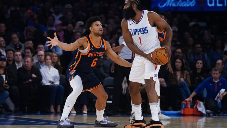 Nov 6, 2023; New York, New York, USA; New York Knicks shooting guard Quentin Grimes (6) defends against Los Angeles Clipper shooting guard James Harden (1) during the first half at Madison Square Garden. Mandatory Credit: Gregory Fisher-USA TODAY Sports