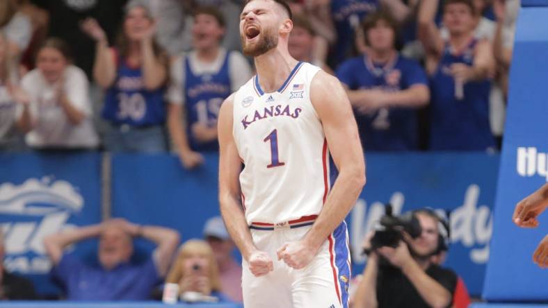 Kansas senior center Hunter Dickinson (1) reacts after sinking a three in the first half of Monday's game against North Carolina Central inside Allen Fieldhouse.