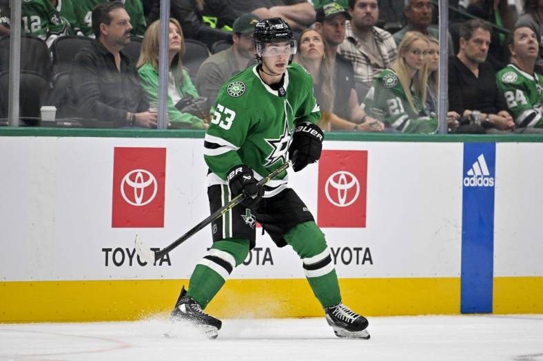 Nov 6, 2023; Dallas, Texas, USA; Dallas Stars center Wyatt Johnston (53) looks for the puck in the Boston Bruins zone during the third period at the American Airlines Center. Mandatory Credit: Jerome Miron-USA TODAY Sports