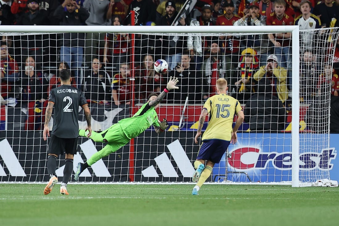 Nov 6, 2023; Sandy, Utah, USA; Houston Dynamo goalkeeper Steve Clark (12) allows a goal scored by Real Salt Lake forward Jefferson Savarino (10) during the second half  at America First Field. Mandatory Credit: Rob Gray-USA TODAY Sports