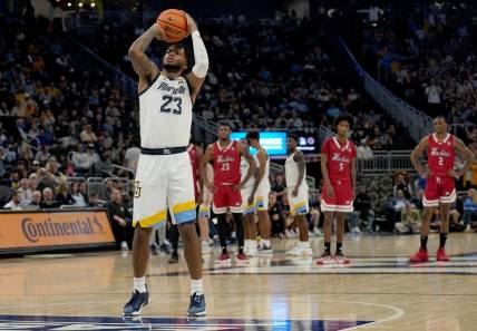 Nov 6, 2023; Milwaukee, Wisconsin, USA; Marquette forward David Joplin (23) shoots a free throw after a flagrant foul during the first half of their game against Northern Illinois  at Fiserv Forum. Mandatory Credit: Mark Hoffman-USA TODAY Sports
