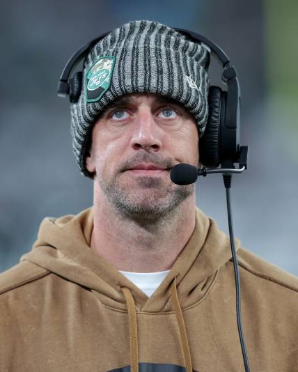 Nov 6, 2023; East Rutherford, New Jersey, USA; New York Jets injured quarterback Aaron Rodgers reacts during the third quarter against the Los Angeles Chargers at MetLife Stadium. Mandatory Credit: Brad Penner-USA TODAY Sports