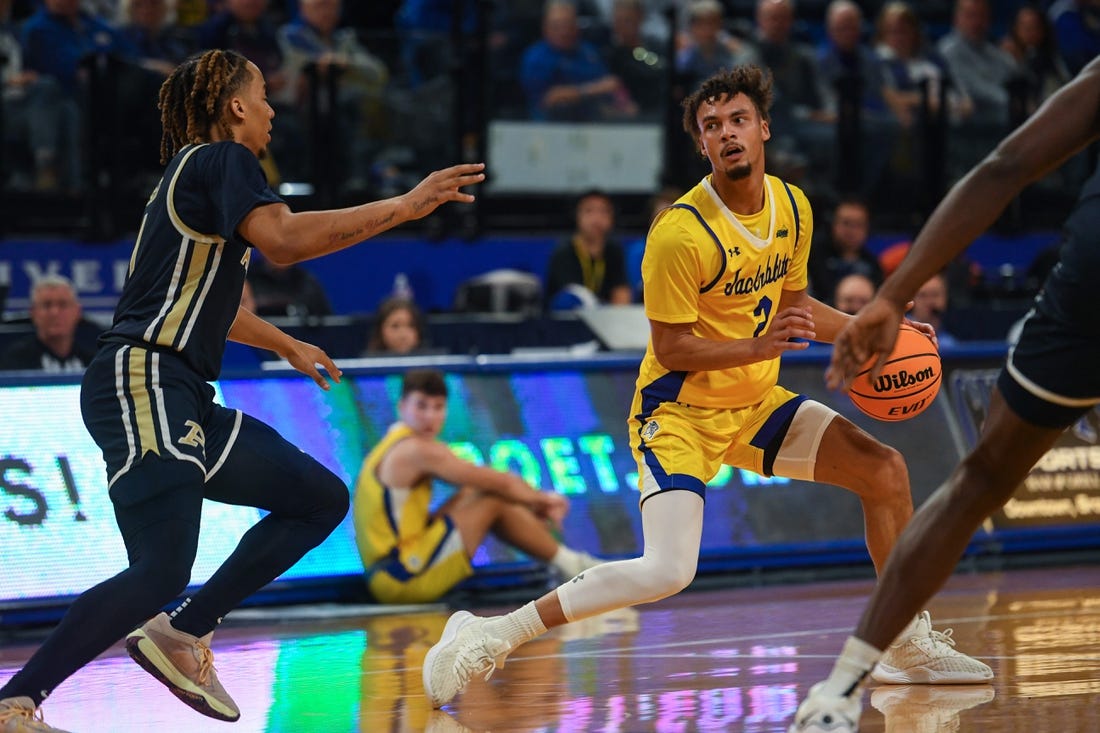 SDSU   s guard Zeke Mayo (2) looks for an opening to pass the ball during a game against Akron on Monday, Nov. 6, 2023 at Frost Arena in Brookings, South Dakota.