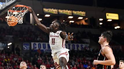 Rutgers' Clifford Omoruyi dunks during the men's college basketball game between Rutgers and Princeton played at the Cure Insurance Arena in Trenton on Monday, November 6, 2023.