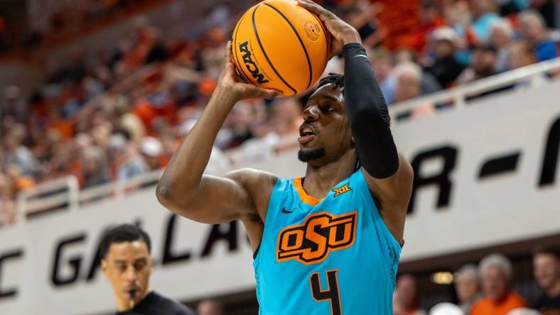 Oklahoma State guard Jarius Hicklen (4) shoots the ball during the first half of an NCAA men  s college basketball game against Abilene Christian Monday, Nov. 6, 2023., in Stillwater, Okla. (Mitch Alcala for the Oklahoman)