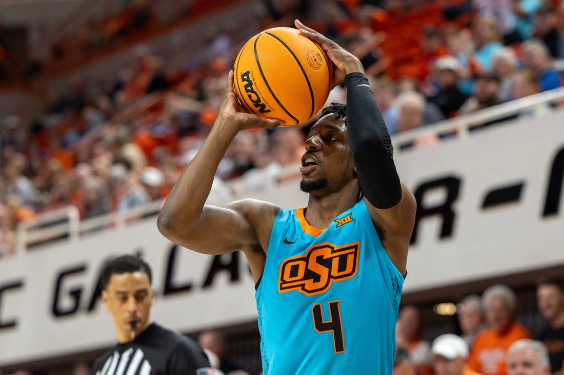 Oklahoma State guard Jarius Hicklen (4) shoots the ball during the first half of an NCAA men  s college basketball game against Abilene Christian Monday, Nov. 6, 2023., in Stillwater, Okla. (Mitch Alcala for the Oklahoman)