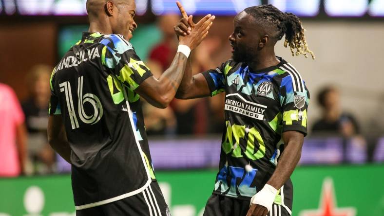 Nov 7, 2023; Atlanta, Georgia, USA; Atlanta United forward 
Xande Silva (16) celebrates with midfielder Tristan Muyumba (8) after scoring a goal in the first half against Columbus Crew at Mercedes-Benz Stadium. Mandatory Credit: Brett Davis -USA TODAY Sports