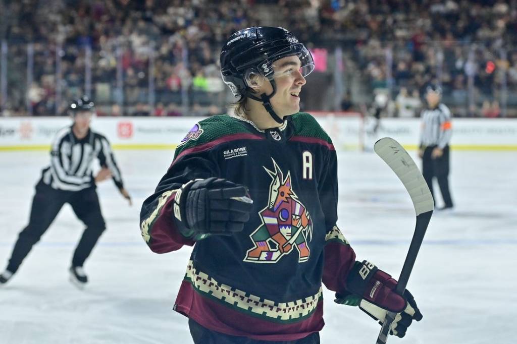 Nov 7, 2023; Tempe, Arizona, USA; Arizona Coyotes right wing Clayton Keller (9) celebrates after scoring a goal in the second period against the Seattle Kraken at Mullett Arena. Mandatory Credit: Matt Kartozian-USA TODAY Sports