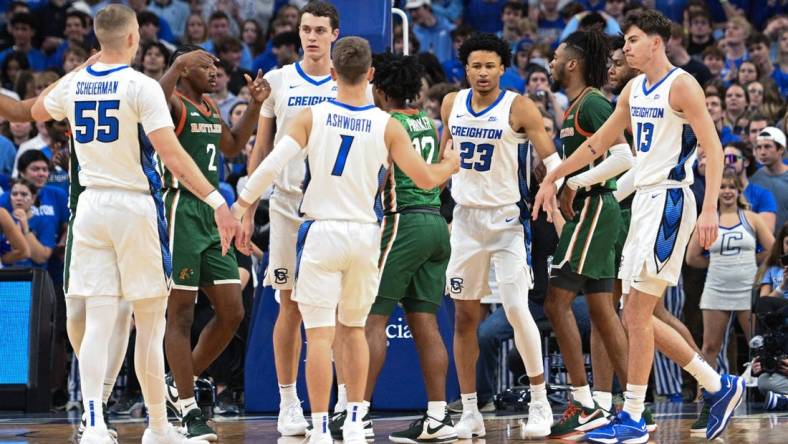 Nov 7, 2023; Omaha, Nebraska, USA;  Creighton Bluejays guard Trey Alexander (23) celebrates with teammates after scoring against the Florida A&M Rattlers in the first half at CHI Health Center Omaha. Mandatory Credit: Steven Branscombe-USA TODAY Sports