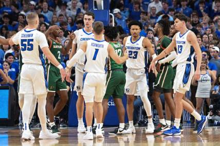 Nov 7, 2023; Omaha, Nebraska, USA;  Creighton Bluejays guard Trey Alexander (23) celebrates with teammates after scoring against the Florida A&M Rattlers in the first half at CHI Health Center Omaha. Mandatory Credit: Steven Branscombe-USA TODAY Sports