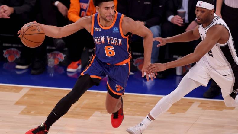 Nov 8, 2023; New York, New York, USA; New York Knicks guard Quentin Grimes (6) controls the ball against San Antonio Spurs guard Malaki Branham (22) during the first quarter at Madison Square Garden. Mandatory Credit: Brad Penner-USA TODAY Sports