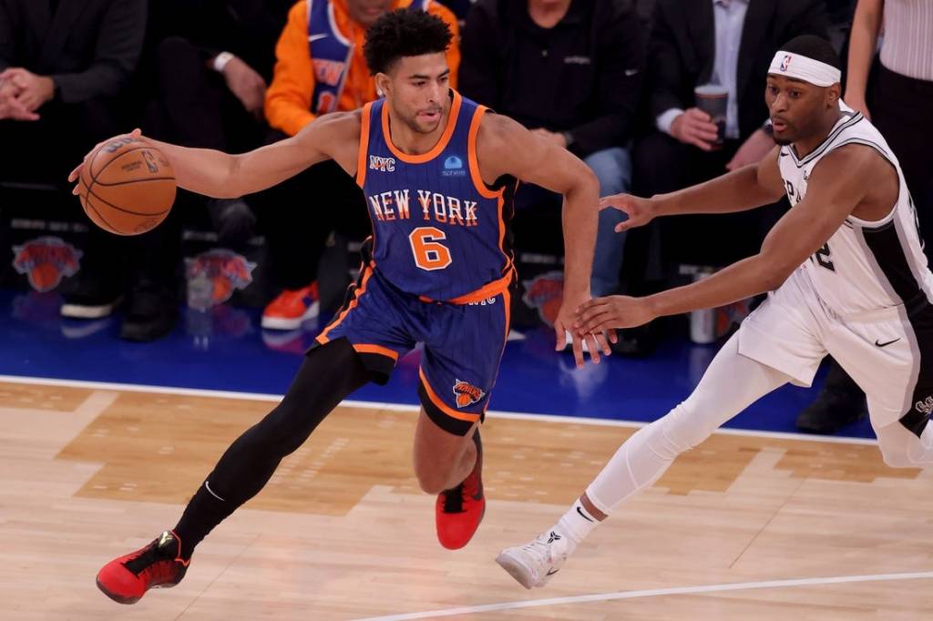 Nov 8, 2023; New York, New York, USA; New York Knicks guard Quentin Grimes (6) controls the ball against San Antonio Spurs guard Malaki Branham (22) during the first quarter at Madison Square Garden. Mandatory Credit: Brad Penner-USA TODAY Sports