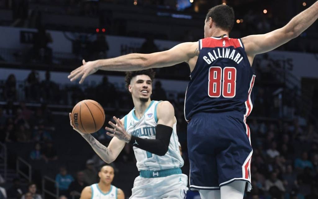 Nov 8, 2023; Charlotte, North Carolina, USA; Charlotte Hornets guard LaMelo Ball (1) looks to pass as he is defended by Washington Wizards Danilo Gallinari (88) during the first half at the Spectrum Center. Mandatory Credit: Sam Sharpe-USA TODAY Sports