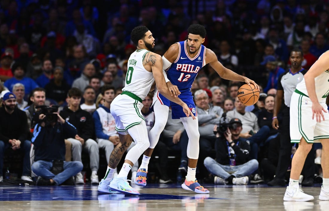 Nov 8, 2023; Philadelphia, Pennsylvania, USA; Boston Celtics forward Jayson Tatum (0) defends Philadelphia 76ers forward Tobias Harris (12) in the second quarter at Wells Fargo Center. Mandatory Credit: Kyle Ross-USA TODAY Sports