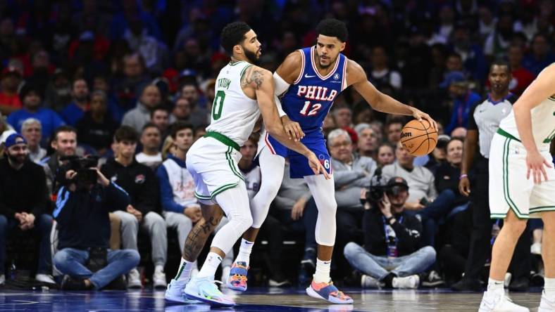 Nov 8, 2023; Philadelphia, Pennsylvania, USA; Boston Celtics forward Jayson Tatum (0) defends Philadelphia 76ers forward Tobias Harris (12) in the second quarter at Wells Fargo Center. Mandatory Credit: Kyle Ross-USA TODAY Sports