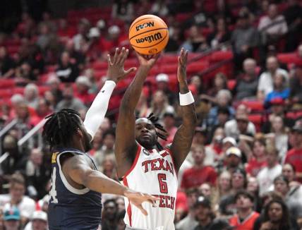 Texas Tech's guard Joe Toussaint (6) shoots the ball against Texas A&M-Commerce in the first home game of the season, Wednesday, Nov. 8, 2023, at United Supermarkets Arena.