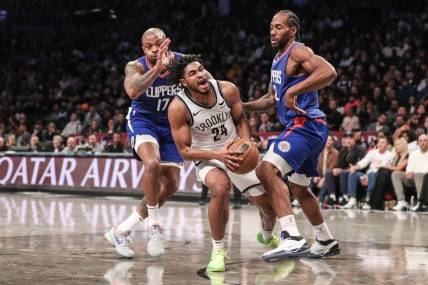 Nov 8, 2023; Brooklyn, New York, USA;  Brooklyn Nets guard Cam Thomas (24) is double teamed by LA Clippers forwards P.J. Tucker (17) and Kawhi Leonard (2) in the second quarter at Barclays Center. Mandatory Credit: Wendell Cruz-USA TODAY Sports