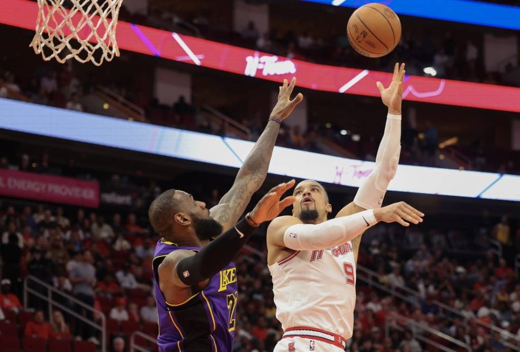 Nov 8, 2023; Houston, Texas, USA; Houston Rockets forward Dillon Brooks (9) shoots against Los Angeles Lakers forward LeBron James (23) in the first quarter at Toyota Center. Mandatory Credit: Thomas Shea-USA TODAY Sports