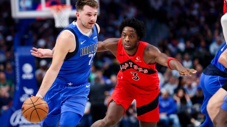 Nov 8, 2023; Dallas, Texas, USA;  Dallas Mavericks guard Luka Doncic (77) dribbles past Toronto Raptors forward O.G. Anunoby (3) during the first quarter at American Airlines Center. Mandatory Credit: Kevin Jairaj-USA TODAY Sports