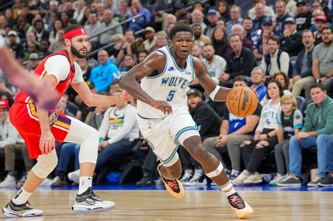 Nov 8, 2023; Minneapolis, Minnesota, USA; Minnesota Timberwolves guard Anthony Edwards (5) dribbles against the New Orleans Pelicans in the second quarter at Target Center. Mandatory Credit: Brad Rempel-USA TODAY Sports