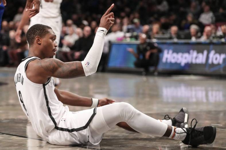 Nov 8, 2023; Brooklyn, New York, USA;  Brooklyn Nets guard Lonnie Walker IV (8) reacts after being fouled in the second quarter against the LA Clippers at Barclays Center. Mandatory Credit: Wendell Cruz-USA TODAY Sports