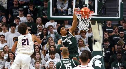 Nov 9, 2023; East Lansing, Michigan, USA; Michigan State Spartans guard Jaden Akins (3) dunks on a drive in the first half against the Southern Indiana Screaming Eagles at Jack Breslin Student Events Center. Mandatory Credit: Dale Young-USA TODAY Sports