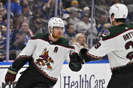 Nov 9, 2023; St. Louis, Missouri, USA;  Arizona Coyotes left wing Lawson Crouse (67) is congratulated by center Barrett Hayton (29) after scoring against the St. Louis Blues during the first period at Enterprise Center. Mandatory Credit: Jeff Curry-USA TODAY Sports