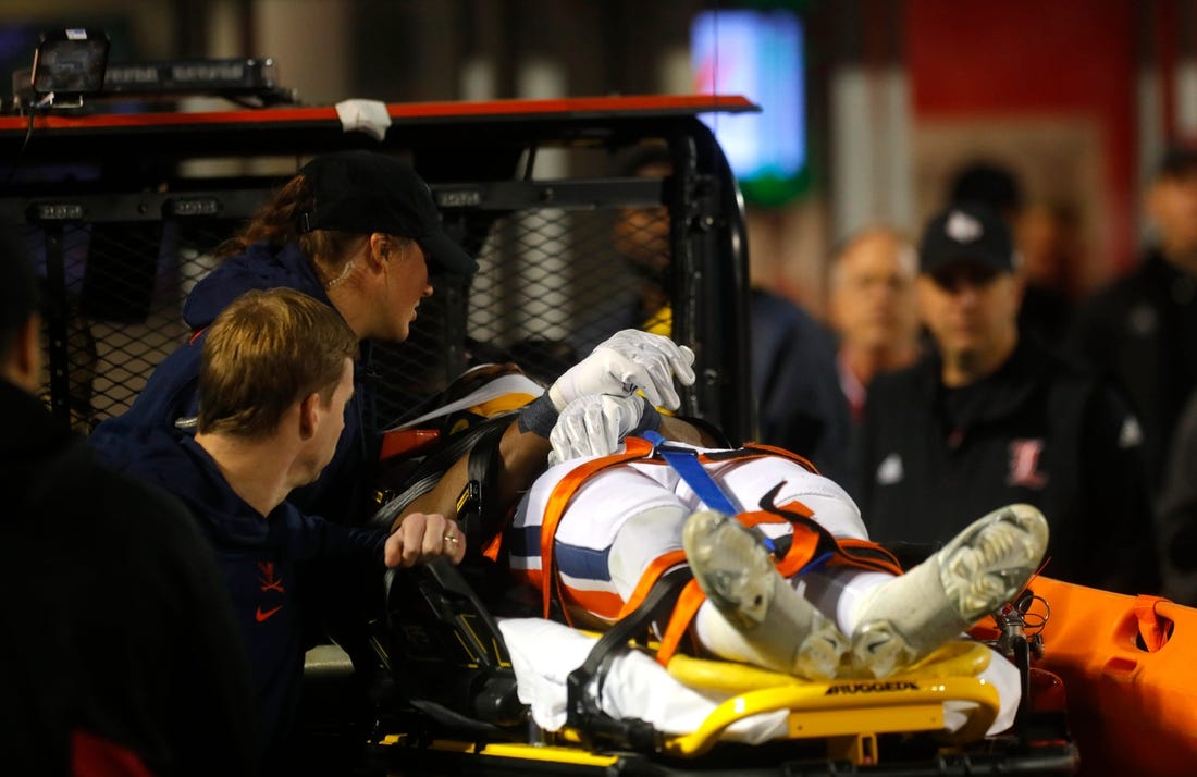 Virginia   s Perris Jones is carted off the field against Louisville in L & N Stadium. 
Nov. 9, 2023