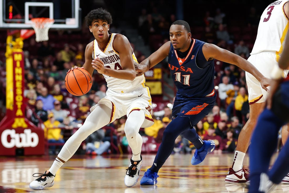 Nov 10, 2023; Minneapolis, Minnesota, USA; Minnesota Golden Gophers guard Cam Christie (24) works around Texas-San Antonio Roadrunners guard Isaiah Wyatt (11) during the first half at Williams Arena. Mandatory Credit: Matt Krohn-USA TODAY Sports