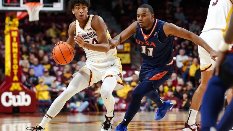 Nov 10, 2023; Minneapolis, Minnesota, USA; Minnesota Golden Gophers guard Cam Christie (24) works around Texas-San Antonio Roadrunners guard Isaiah Wyatt (11) during the first half at Williams Arena. Mandatory Credit: Matt Krohn-USA TODAY Sports