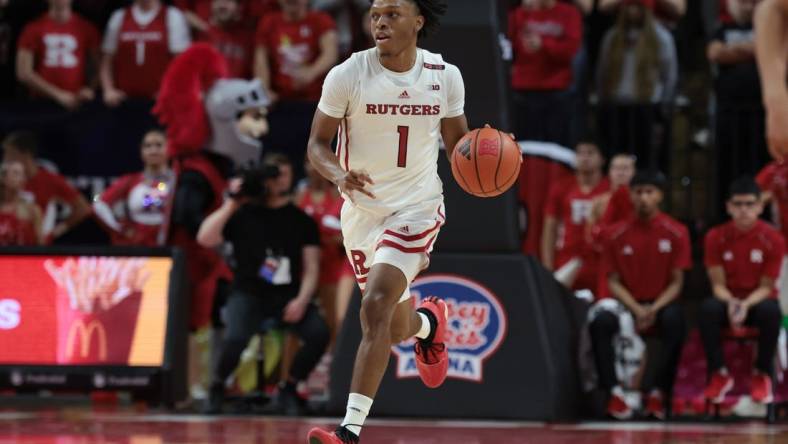 Nov 10, 2023; Piscataway, New Jersey, USA; Rutgers Scarlet Knights guard Jamichael Davis (1) dribbles up court  during the second half against the Boston University Terriers at Jersey Mike's Arena. Mandatory Credit: Vincent Carchietta-USA TODAY Sports