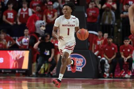 Nov 10, 2023; Piscataway, New Jersey, USA; Rutgers Scarlet Knights guard Jamichael Davis (1) dribbles up court  during the second half against the Boston University Terriers at Jersey Mike's Arena. Mandatory Credit: Vincent Carchietta-USA TODAY Sports