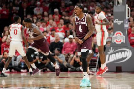 Nov 10, 2023; Columbus, Ohio, USA; Texas A&M Aggies guard Wade Taylor IV (4) celebrates a basket during the second half of the NCAA basketball game against the Ohio State Buckeyes at Value City Arena. Ohio State lost 73-66.