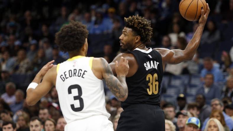 Nov 10, 2023; Memphis, Tennessee, USA; Memphis Grizzlies guard Marcus Smart (36) handles the ball as Utah Jazz guard Keyonte George (3) defends during the first half at FedExForum. Mandatory Credit: Petre Thomas-USA TODAY Sports