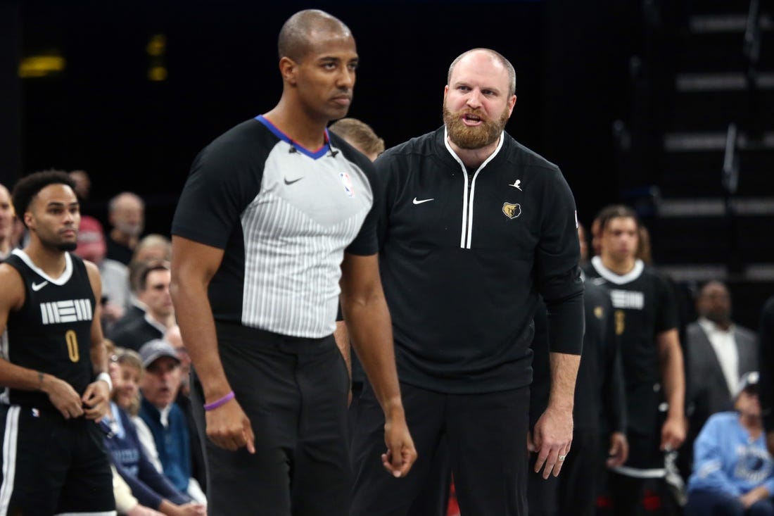 Nov 10, 2023; Memphis, Tennessee, USA; Memphis Grizzlies head coach Taylor Jenkins (right) reacts to a referee after a foul call during the second half against the Utah Jazz at FedExForum. Mandatory Credit: Petre Thomas-USA TODAY Sports