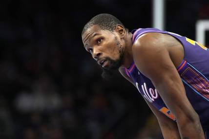 Nov 10, 2023; Phoenix, Arizona, USA; Phoenix Suns forward Kevin Durant (35) watches a replay against the Los Angeles Lakers in the first half at Footprint Center. Mandatory Credit: Rick Scuteri-USA TODAY Sports