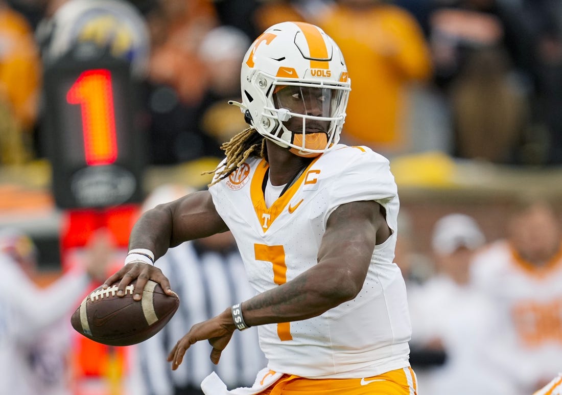 Nov 11, 2023; Columbia, Missouri, USA; Tennessee Volunteers quarterback Joe Milton III (7) throws a pass during the first half against the Missouri Tigers at Faurot Field at Memorial Stadium. Mandatory Credit: Jay Biggerstaff-USA TODAY Sports