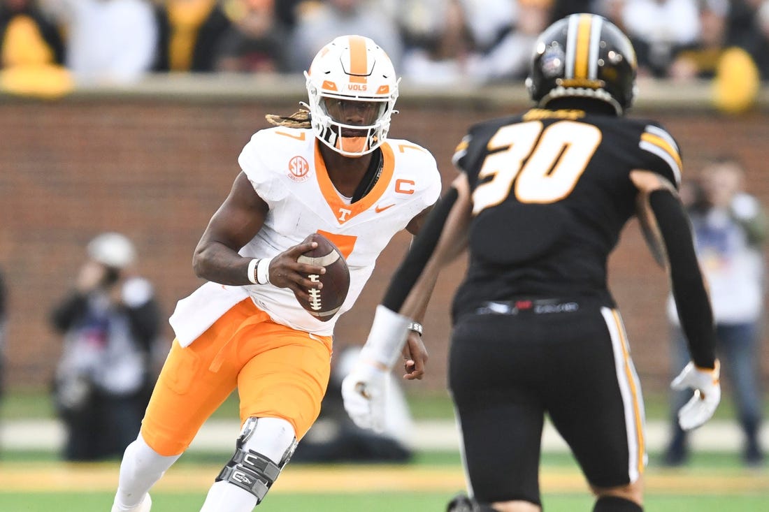 Tennessee quarterback Joe Milton III (7) runs with the ball during NCAA college football game against Missouri on Saturday, November 11, 2023 in Columbia, MO.