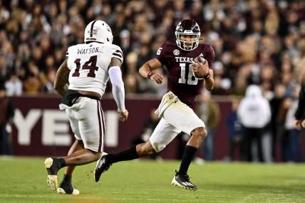Nov 11, 2023; College Station, Texas, USA; Texas A&M Aggies quarterback Jaylen Henderson (16) run the ball during the second quarter against the Mississippi State Bulldogs at Kyle Field. Mandatory Credit: Maria Lysaker-USA TODAY Sports