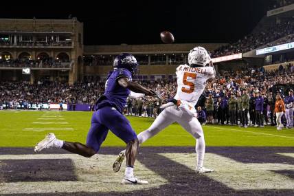 Texas Longhorns wide receiver Adonai Mitchell (5) makes a catch for a touchdown during the game against Texas Christian University at Amon G. Carter Stadium on Saturday, Nov. 11, 2023 in Fort Worth, Texas.