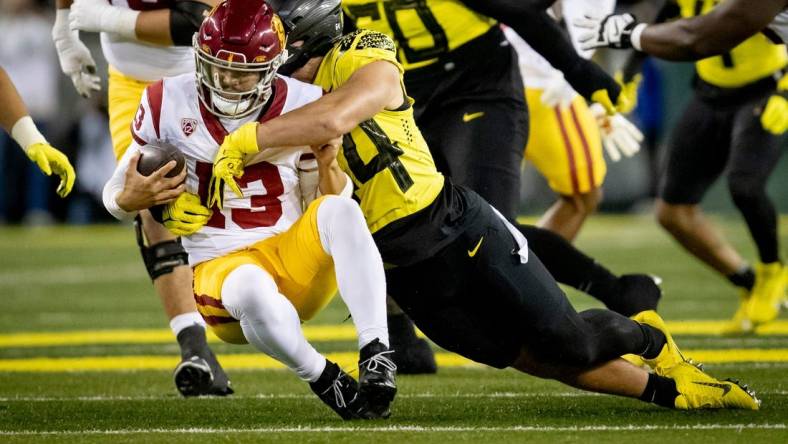 Oregon outside linebacker Teitum Tuioti sacks USC quarterback Caleb Williams as the No. 6 Oregon Ducks host the USC Trojans Saturday, Nov. 11, 2023, at Autzen Stadium in Eugene, Ore.