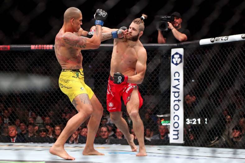 Nov 11, 2023; New York, NY, USA; Jiri Prochazka (red gloves) fights Alex Pereira (blue gloves) during UFC 295 at Madison Square Garden. Mandatory Credit: Wendell Cruz-USA TODAY Sports