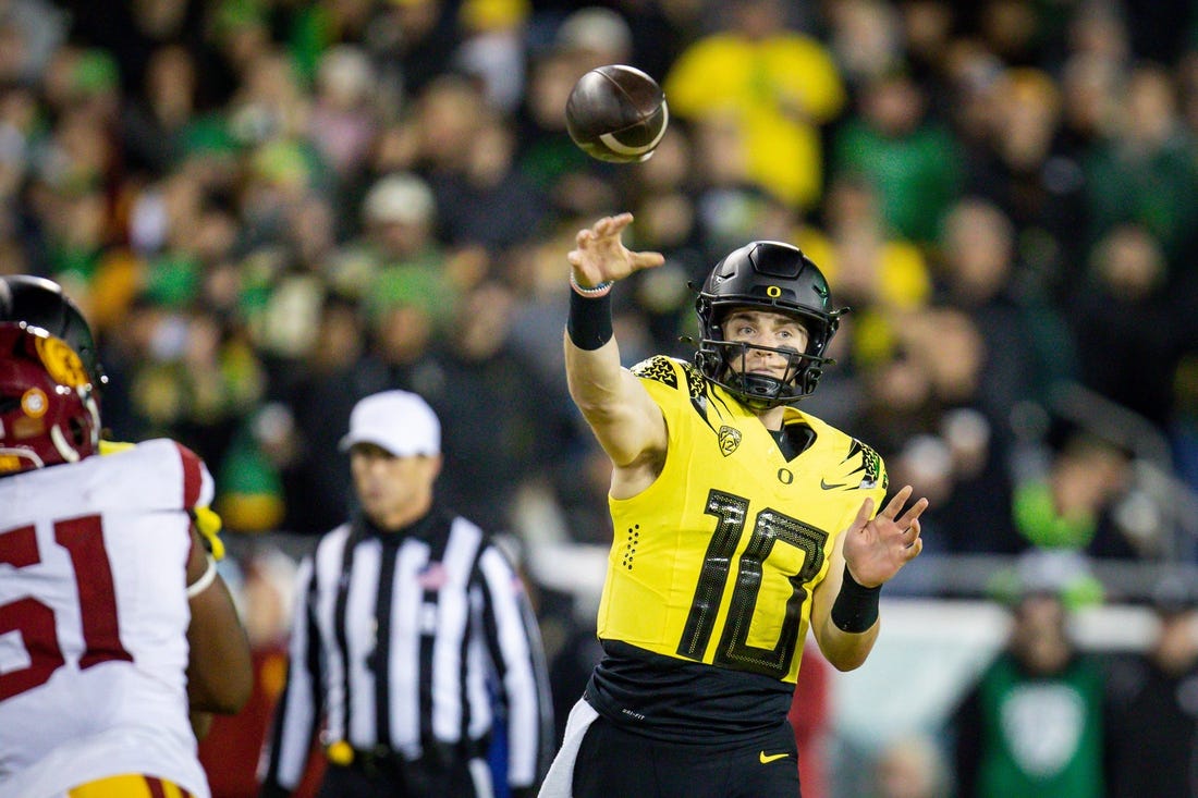 Oregon quarterback Bo Nix throws out a pass as the No. 6 Oregon Ducks host the USC Trojans Saturday, Nov. 11, 2023, at Autzen Stadium in Eugene, Ore.