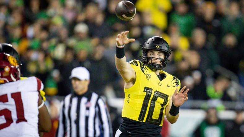 Oregon quarterback Bo Nix throws out a pass as the No. 6 Oregon Ducks host the USC Trojans Saturday, Nov. 11, 2023, at Autzen Stadium in Eugene, Ore.